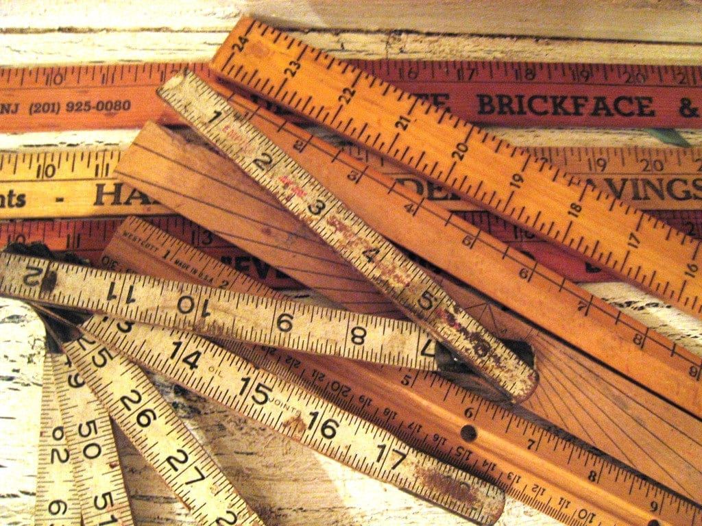Image of a variety of rulers in a pile