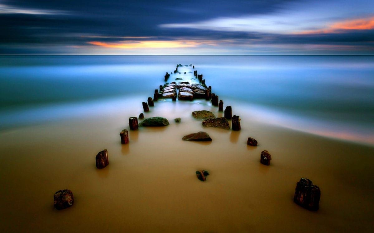 Image of an old dock going into the water